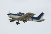 G-BCJM @ EGFH - Piper Cherokee departing Runway 22 - by Roger Winser