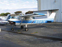N10975 @ KHWD - 1973 Cessna 150L minus cowling cover @ KHWD/Hayward Air Terminal, CA home base in Oct 2005 - by Steve Nation
