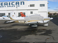 N26134 @ KHWD - 1977 Grumman American AA-5A akll bundled up (in old colors, too) @ KHWD/Hayward Air Terminal, CA in Oct 2005 (sold to new owner in Southern California Jun 2006) - by Steve Nation