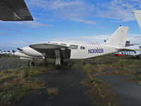 N30028 @ KHWD - All white 1992 Piper PA-34-220T @ KHWD/Hayward Air Terminal, CA in Oct 2005 - by Steve Nation