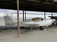 N911XS @ CCB - Parked under the hangers on the northside - by Helicopterfriend