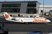 C-FVKN @ BOS - Orange colored Jazz CRJ - by Duncan Kirk