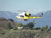 N110LA @ POC - Westbound, flaring to slow own prior to making a turn south to go to helipad - by Helicopterfriend