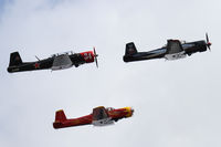 N34FP @ PAE - Three Nanchangs were joined by six others doing flybys at PAE for this major historical aircraft event - by Duncan Kirk