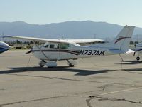 N737AM @ CNO - Parked east of the tower - by Helicopterfriend