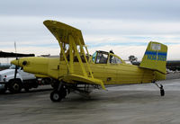 N3630D - Pilot of Tolle's Flying Service (Robbins, CA) Turbine 1984 G-164B runs through checklist before taxiing for take-off at owner's private airstrip near junction of State Hwy 113 and Reclamation Road - applying fertilizer pellets to wheat this day with sprea - by Steve Nation