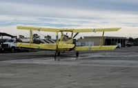 N7509Y - Tolle's Flying Service (Robbins, CA) Turbine 1992 G-164B-20T taxis for take-off at owner's private airstrip near junction of State Hwy 113 and Reclamation Road - applying liquid fertilizer to wheat this day with spray bars