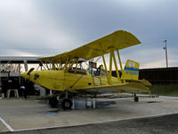 N7509Y - Tolle's Flying Service (Robbins, CA) 1992 G-164B-20T on wash stand between flights at owner's private airstrip near junction of State Hwy 113 and Reclamation Road - applying liquid fertilizer to wheat this day with spray bars - by Steve Nation