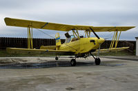 N7509Y - Tolle's Flying Service (Robbins, CA) 1992 G-164B-20T on wash stand between flights at owner's private airstrip near junction of State Hwy 113 and Reclamation Road - applying liquid fertilizer to wheat this day with spray bars - by Steve Nation