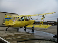 N7509Y - Tolle's Flying Service (Robbins, CA) 1992 G-164B-20T on wash stand between flights at owner's private airstrip near junction of State Hwy 113 and Reclamation Road - applying liquid fertilizer to wheat this day with spray bars - by Steve Nation