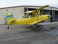 N36265 - Tolle's Flying Service (Robbins, CA) 1983 turbine G-164B taxis for take-off at owner's private airstrip near junction of State Hwy 113 and Reclamation Road - applying dry fertilizer to wheat this day with spreader - by Steve Nation