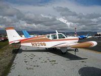 N928B @ KWVI - 1961 Beech 35-A33 Bonanza with tip tanks visiting from Half Moon Bay @ Watsonville, CA - by Steve Nation