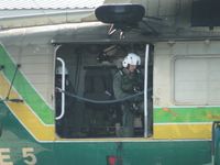 N950DG @ POC - Crewman getting ready for take off taxi - by Helicopterfriend