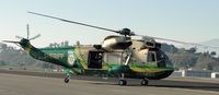 N950DG @ POC - Taxiing onto taxiway Sierra heading towards taxiway Coco - by Helicopterfriend