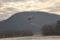 N206BE - Hauling water to fight fire on mountain at McCoy Falls - by Richard Cobb