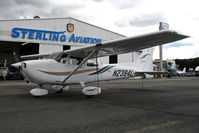 N2384L @ KCCR - Locally-based Sterling Flight Center 1999 Cessna 172R in old gold-blue-green highlight colors @ Buchanan Field, Concord, CA just before a storm - by Steve Nation