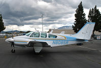N8085R @ KCCR - 1969 Beech 95-B55 on visitor's ramp @ Buchanan Field, Concord, CA just before a storm - by Steve Nation