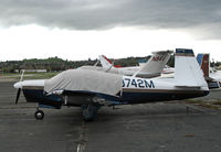 N9742M @ KCCR - 1967 Mooney M20C buttoned-up @ Buchanan Field, Concord, CA just before a storm - by Steve Nation