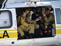 N110LA @ POC - Helicopter crew member showing firefighters how to use the radio - by Helicopterfriend