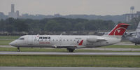 N8631E @ KMSP - Stormy day in MSP - by Todd Royer