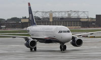 N827AW @ KMSP - Stormy day in MSP - by Todd Royer