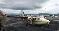 N382JH @ KLVK - 1955 Aero Commander 560-A @ Livermore, CA after the rain - by Steve Nation