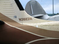 N382JH @ KLVK - Close-up showing registration on 1955 Aero Commander 560-A @ Livermore, CA after the rain - by Steve Nation