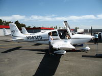 N953CD @ KHWD - Hmmm ... trip around the world or buy this airplane? 2005 Cirrus Design SR22 demo acft @ Hayward, CA - by Steve Nation
