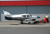 N4796W @ KHWD - 1976 Rockwell Intl 114 getting a push (or a tow) @ Hayward, CA - by Steve Nation