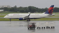 N614CZ @ KMSP - Stormy day in MSP - by Todd Royer