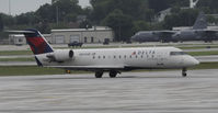 N8948B @ KMSP - Stormy day in MSP - by Todd Royer