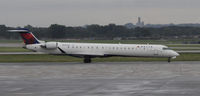 N602LR @ KMSP - Stormy day in MSP - by Todd Royer