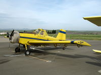 N6024M @ KKIC - Soilserv Air Tractor AT-401 with spreader and engine cover @ Mesa Del Rey Airport, King City, CA (destroyed Dec 6, 2007 when aircraft failed to pull out of turn and hit high ground while applying wheat seed NW of King City, CA; pilot OK)