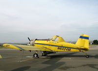 N6024M @ KKIC - Soilserv Air Tractor AT-401 with spreader and engine cover @ Mesa Del Rey Airport, King City, CA (destroyed Dec 6, 2007 when aircraft failed to pull out of turn and hit high ground while applying wheat seed NW of King City, CA; pilot OK) - by Steve Nation