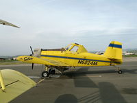 N6024M @ KKIC - Soilserv Air Tractor AT-401 with spreader and engine cover @ Mesa Del Rey Airport, King City, CA (destroyed Dec 6, 2007 when aircraft failed to pull out of turn and hit high ground while applying wheat seed NW of King City, CA; pilot OK) - by Steve Nation