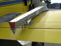 N6024M @ KKIC - Close-up of Automatic Flagman on starboard wing of Soilserv Air Tractor AT-401 @ Mesa Del Rey Airport, King City, CA (destroyed Dec 6, 2007 when aircraft failed to pull out of turn and hit high ground while applying wheat seed NW of King City, CA; pilot O - by Steve Nation