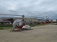 N1310X @ KKIC - Soilserv 1966 Bell 47G-5 sprayer in non-standard red cs @ Mesa Del Rey Airport, King City, CA - by Steve Nation