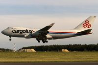 LX-UCV @ ELLX - on final RW06 - by Friedrich Becker