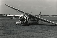 N88WT @ KDPA - Ex-N88WT, US Navy NH-1 29457.  B&W photo, taken a couple days after the mishap, for publishing in Air Classics Magazine, January 1984. - by Glenn E. Chatfield