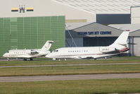 CS-DLC @ EGCC - NetJets Transportes Aereos - by Chris Hall