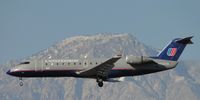 N935SW @ ONT - Approaching outer fence to runway 26R - by Helicopterfriend