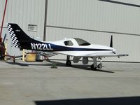 N122LL @ CNO - Parked next to a hanger - by Helicopterfriend