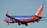 N939WN @ ONT - Passing over the outer fence enroute to runway 26R - by Helicopterfriend