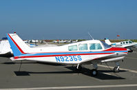 N9235S @ KSQL - Locally-based 1975 Beech C23 Muskateer in bright sunshine @ San Carlos, CA - by Steve Nation