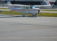 N73671 @ KSQL - 1976 Cessna 172N taxis to visitors ramp @ San Carlos, CA - by Steve Nation