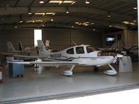 N450AP @ O41 - Nice hangar shot of 2004 Cirrus Design SR22 minus engine cowl cover @ Woodland Aviation - by Steve Nation