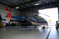 N3890B @ BVU - Sitting in the hangar with N7535G, N203LH, and N6703S - by Nick Taylor Photography