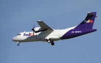 N919FX @ ONT - On final approach to runway 26R - by Helicopterfriend