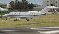 N986QS @ TNCM - N986QS landing at TNCM