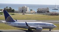 N14731 @ TNCM - Continental N14731 taxing to the holding point A